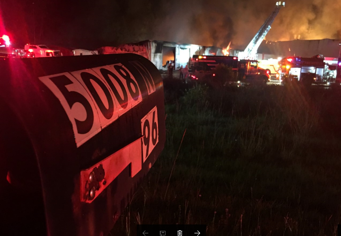 Fire crews battle a structure fire between Silsbee and Evadale